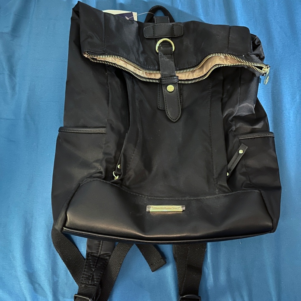 Madden Girl Black Backpack with Classic Design and Smooth Finish